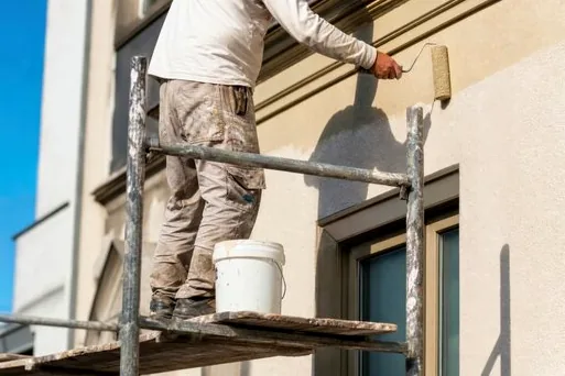 Smooth stucco repaint from scaffolding in Newport Heights